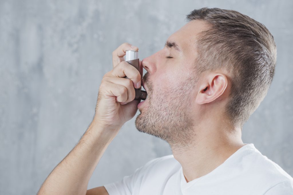Signs and Symptoms of Asthma in Adults including wheezing, coughing, shortness of breath, and chest tightness